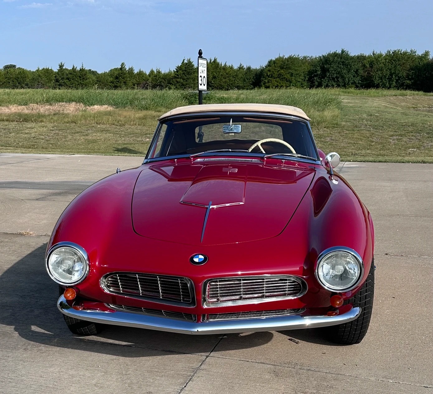 Classic red BMW restoration showcasing Arthur Payne & Sons' commitment to period-correct color and panel-perfect