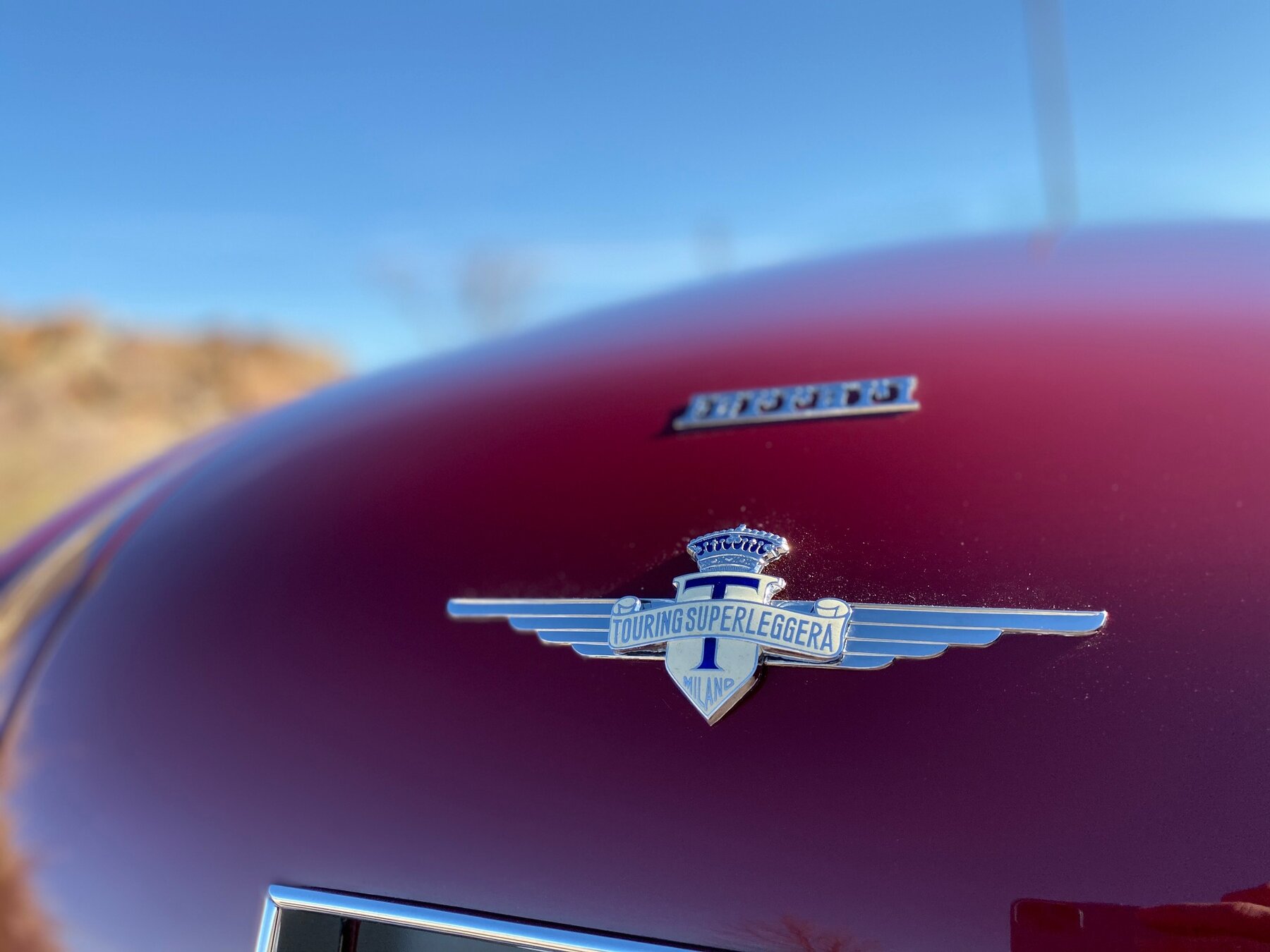 Touring badge &middot; Superleggera crest
